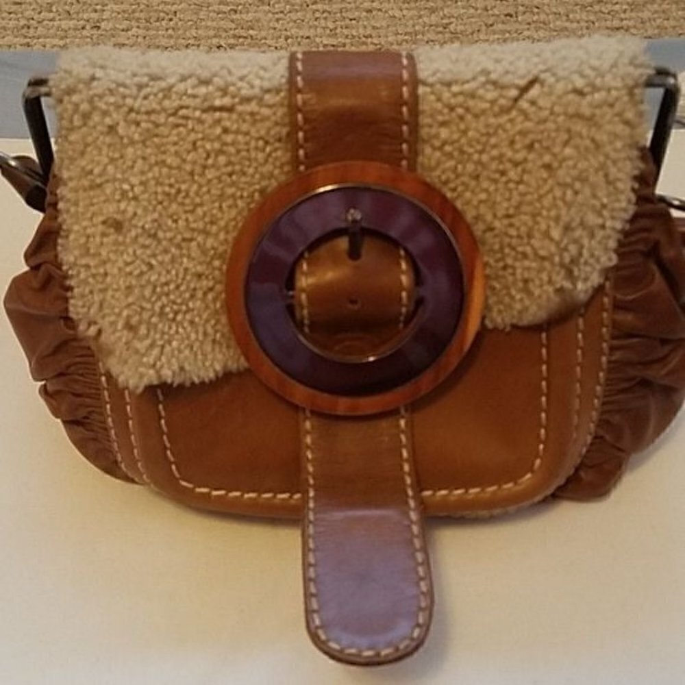 Jamin Peuch accordian bag.
